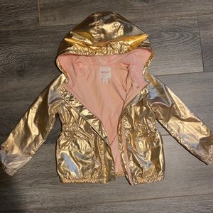 A gold Cat & Jack rain jacket.